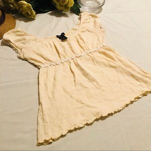 MODA INTERNATIONAL- Cute yellow flare bottom top.